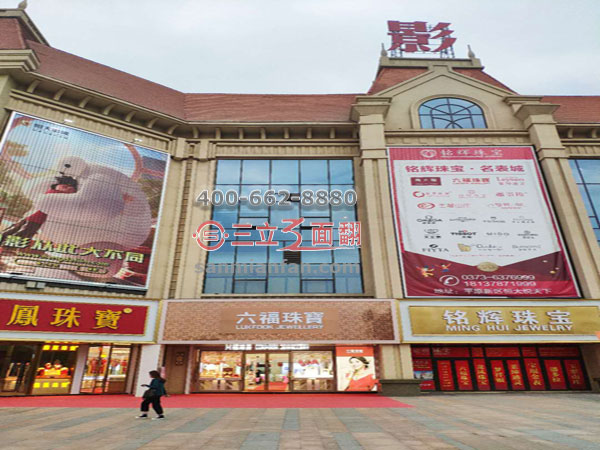 河南駐馬店室外墻壁掛式三面翻超高廣告牌案例施工圖片