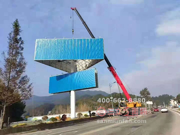 云南省開(kāi)遠(yuǎn)市單立柱三面翻高炮雙層廣告牌案例施工圖片